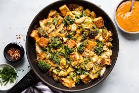 Tofu is low in fat and carbs, has no cholesterol, and is high in protein, calcium, magnesium and iron. Tofu Stir Fry With Vegetables And Peanut Sauce The Modern Proper