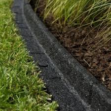 How to install plastic landscape edging around a planting bed. Rubberific 4 Ft Black Rubber Landscape Edging Section Lowes Com Landscape Edging Front Yard Landscaping Design Playground Mulch