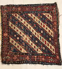 antique caucasian sumak bagface rugs