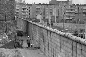 the story of berlin wall in pictures  west german construction workers have a chat in west berlin 18 1967 beside the wall separating the city