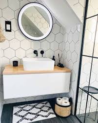 white hexagon tile with black grout