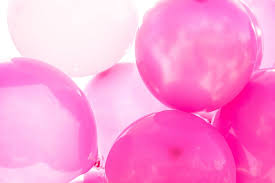 closeup photo of pink balloons shiny