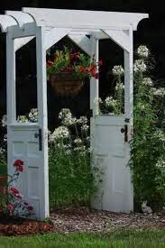Old Doors Upcycled Into Garden Arbor