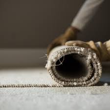 how to remove wall to wall carpet