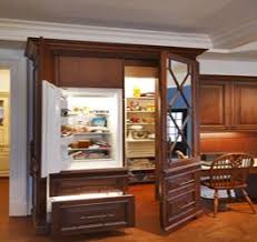 For an uncluttered look in your kitchen, check out these clever ways to keep your fridge incognito. Hidden Fridge Hidden Pantry It S Like A Grown Up Narnia Luxury Kitchen Design Luxury Kitchen Cabinets Traditional Kitchen Design