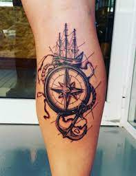 Ships wheel, anchor, and compass. 100 Awesome Compass Tattoo Designs Cuded Compass Tattoo Tattoos For Guys Sleeve Tattoos