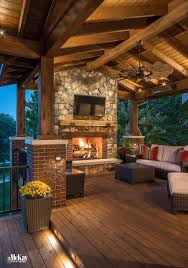 Explore a wide variety of farmhouse deck designs and discover new ideas for layouts, material and decor. Outdoor Fireplace Lighting Ideas Transform Your Evening Experience