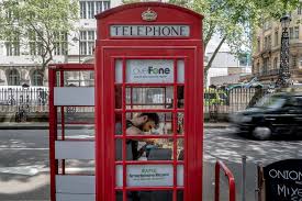 The early telephone booths were manufactured from wood with ornate trim and design. The Red Phone Box A British Icon Stages A Comeback The New York Times