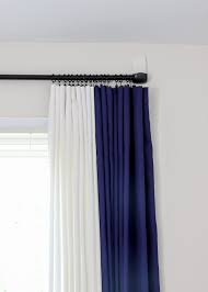 to hang a curtain rod without drilling