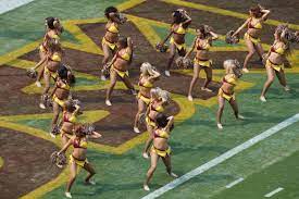 Washington's NFL Cheerleaders Say They Had To Pose Topless As VIPs Watched  | Colorado Public Radio