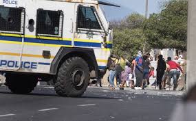 Police and law enforcement officials in cape town prevented rioters from reaching the capricorn shopping centre near the vrygrond township in south africa on july 14. Winde Looks To Law Enforcement To Help Stop Looting Of Stores