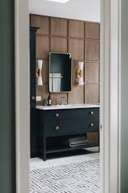 black washstand on brown wooden accent