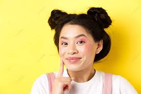 smiling asian with glam makeup and