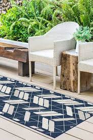 38 best outdoor rugs to rev your