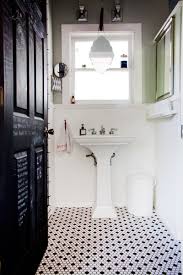 bathroom with a pedestal sink