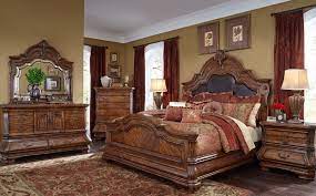 Featuring rich old world carvings and scallop shaped pieces, the bedroom set is accentuated with the grandeur and splendor of the french court. Michael Amini Tuscano Melange Queen Bedroom Set