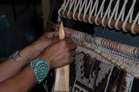 a two faced navajo weaving by gilbert be