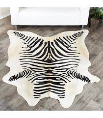 zebra print cowhide rug black on