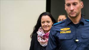 Zschäpe appeared in court wearing a smart jacket and large hoop earrings, and smiling, her arms folded in a defiant stance. German Neo Nazi Beate Zschape Sentenced To Life For Nsu Murders Crackdown Chroniclescrackdown Chronicles