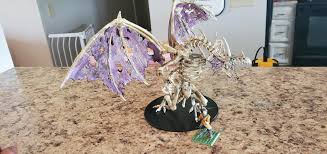 Latest pathfinder products in the open gaming store. Wizkids Pathfinder Deep Cuts Gargantuan Skeletal Dragon Done With Apple Barrel Ivory Reaper Brown And Sepia Wash Army Painter Beholder Purple And Merfolk Turquoise Minipainting