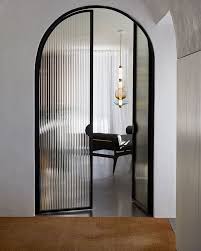 Arched Steel Doors With Fluted Glass