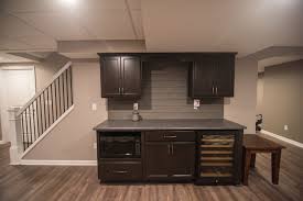 Basement Remodel With Small Bar And