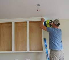adding crown moulding to wall kitchen