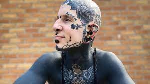 man who has tattooed nearly the whole