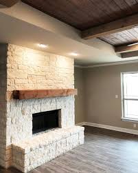 Stone Fireplace With A Cedar Mantel