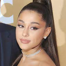 ariana grande wows in a chic checd