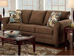 living room decor with dark brown couch