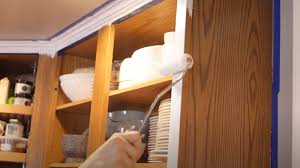 Apply it, wait 15 miutes, and start painting. How To Paint Kitchen Cabinets Without Sanding
