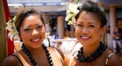 What flower do Hawaiian girls wear in their hair?