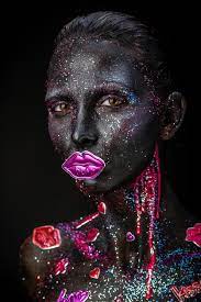 mystical makeup of a woman in the dark