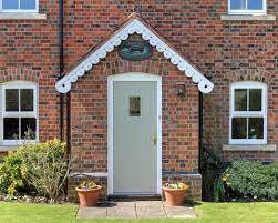 Victorian double front door reconfigured into a more practical single door with glass panels heritage style paintwork and beautifully aligned door furniture. Front Porch Ideas Create A Strong First Impression Homes Gardens