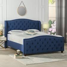 tara curved upholstered wingback bed