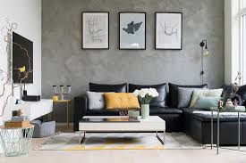 black leather couch and coffee table in