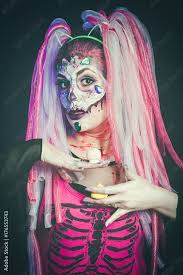 scary halloween woman with sugar skull