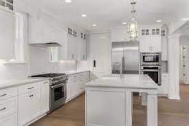 white and stainless steel appliances