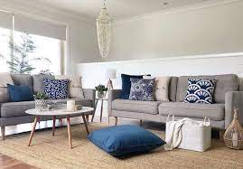 10 grey sofa with blue cushions
