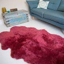 a raspberry pink quad sheepskin rug