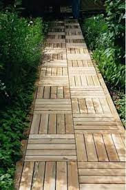 25 Catchy And Cozy Wooden Garden Paths
