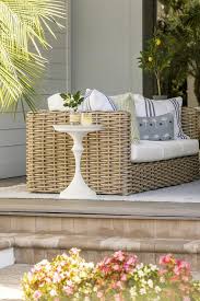 Brown Wicker Outdoor Couch With White