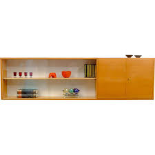 Wall Unit With A Cabinet And Glass