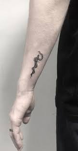 This is a great tattoo that symbolizes dignity, strength and pride. 150 Unique Small Tattoos For Men Tiny Tattoo Designs Tattoo Me Now Side Wrist Tattoos Wrist Tattoos For Guys Tiny Tattoos For Women