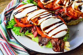 open faced caprese steak sandwich the