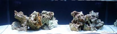 Consider raising the rocks off the bottom of the tankby doing this before the substrate is added to the tank the rocks will be somewhat suspended above the substrate itself. Reef Aquascaping Less Is More For Reef Tanks Reefbum