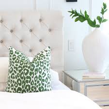 Layer it with prints or solids in similar hues for an untamed, fun arrangement. Designer Pillow In Schumacher Iconic Leopard Green By Chloe Olive