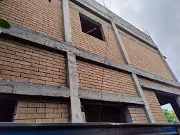 Low Cost Interlocking Brick Construction