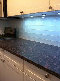 Kitchen With White Glass Subway Tiles